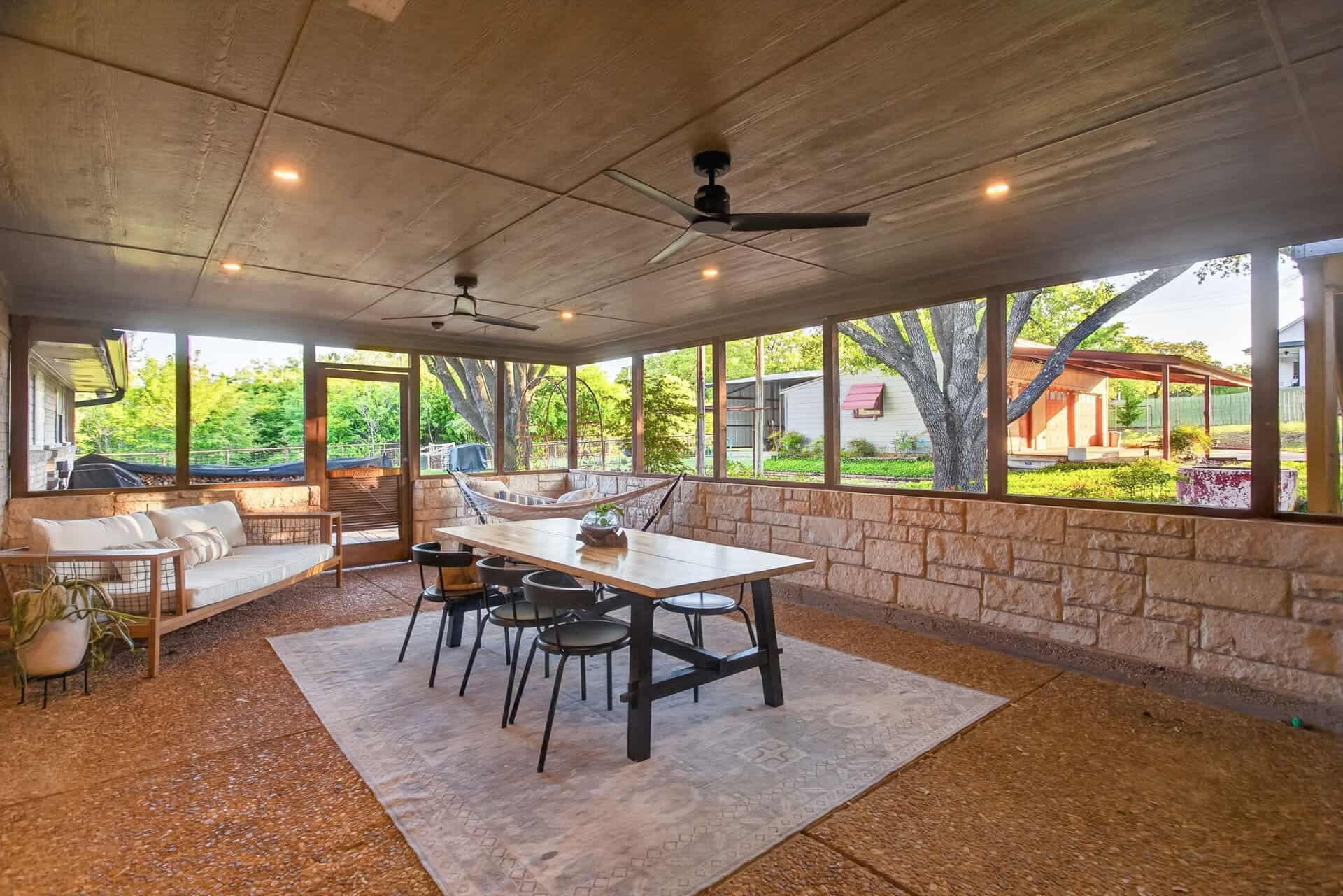 The covered porch at the Localhost Machines farmstead in Rendon, Texas